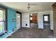 Spacious living room area featuring blue accent wall at 2701 N Gale St, Indianapolis, IN 46218