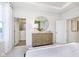 Bright bedroom with dresser and large windows, offering a serene view of the outside at 3279 Morab Dr, Zionsville, IN 46077