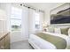 Bright bedroom with large windows, light color palette, and comfortable furnishings at 3279 Morab Dr, Zionsville, IN 46077