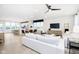 Spacious open-concept area with views of the dining area and kitchen, featuring lots of seating at 3279 Morab Dr, Zionsville, IN 46077