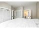 Bright bedroom featuring ensuite bath, ample closet space, and natural light at 33 N Beville Ave, Indianapolis, IN 46201