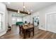 View of dining room, living room, and kitchen in an open layout at 33 N Beville Ave, Indianapolis, IN 46201