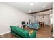 Open concept living room and dining area with a view of the kitchen at 33 N Beville Ave, Indianapolis, IN 46201