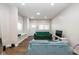 Spacious living room with hardwood floors and large windows at 33 N Beville Ave, Indianapolis, IN 46201