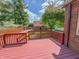 Spacious red deck perfect for outdoor entertaining, overlooking a fenced backyard at 333 N Kenyon St, Indianapolis, IN 46219