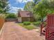 Private brick garage and driveway provide ample parking and storage space at 333 N Kenyon St, Indianapolis, IN 46219