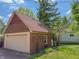 Spacious detached brick garage with ample storage and parking at 333 N Kenyon St, Indianapolis, IN 46219