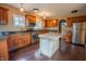 Traditional kitchen featuring granite countertops, stainless steel appliances, and a center island at 333 N Kenyon St, Indianapolis, IN 46219