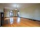 Bright living room featuring hardwood floors, fireplace, and natural light at 333 N Kenyon St, Indianapolis, IN 46219