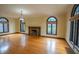 Spacious living room featuring a fireplace and large windows providing ample natural light at 333 N Kenyon St, Indianapolis, IN 46219