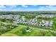 Expansive aerial showcases this community's well-manicured lawns, street layout, and proximity to neighborhood amenities at 3719 Lexham Ct, Danville, IN 46122
