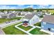 Aerial view of a neighborhood featuring fenced backyards and well-maintained lawns at 3719 Lexham Ct, Danville, IN 46122