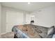 Spacious bedroom with a walk-in closet and neutral decor, perfect for relaxation at 3719 Lexham Ct, Danville, IN 46122