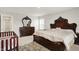 Bedroom featuring wood furniture, an area rug, and natural light from the window at 3719 Lexham Ct, Danville, IN 46122