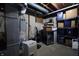 Unfinished basement including the furnace, shelving, and other utilities at 3829 Waycross Dr, Columbus, IN 47203