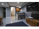 Basement wet bar includes a granite countertop and bar stool seating at 3829 Waycross Dr, Columbus, IN 47203