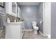 Cozy bathroom with vanity, tiled floor and modern commode at 3829 Waycross Dr, Columbus, IN 47203