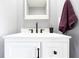 Elegant bathroom with a white vanity, black hardware, and a modern design at 3829 Waycross Dr, Columbus, IN 47203