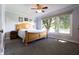 Comfortable bedroom with hardwood flooring and lots of natural light at 3829 Waycross Dr, Columbus, IN 47203