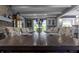 Elegant dining room featuring a large table, stone fireplace, and stylish décor at 3829 Waycross Dr, Columbus, IN 47203