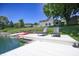 Lakeside dock featuring comfortable seating and easy water access perfect for relaxation and recreation at 3829 Waycross Dr, Columbus, IN 47203
