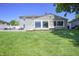 Expansive, lush green backyard with ample space for outdoor activities and relaxation at 3829 Waycross Dr, Columbus, IN 47203