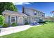 Charming two-story home with green shutters, walkway, and well-manicured lawn at 3829 Waycross Dr, Columbus, IN 47203