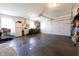 Spacious two car garage with cabinets and plentiful storage space for organization at 3829 Waycross Dr, Columbus, IN 47203