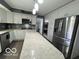 Contemporary kitchen featuring a center island, stainless steel appliances, and granite countertops at 3829 Waycross Dr, Columbus, IN 47203