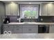 Stylish kitchen with granite counters, stainless steel appliances, and ample cabinet space at 3829 Waycross Dr, Columbus, IN 47203