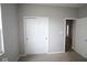 Neutral bedroom featuring a closet and doorway leading to another room at 3998 Bozeman Way, Bargersville, IN 46106