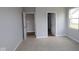 A vacant bedroom with neutral colored carpet, walls, and trim at 3998 Bozeman Way, Bargersville, IN 46106