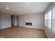 Large living room with modern fireplace, recessed lighting, and hardwood flooring at 3998 Bozeman Way, Bargersville, IN 46106
