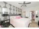 Chic bedroom with decorative wallpaper, plush bedding, and stylish black accents at 410 Angelina Way, Avon, IN 46123