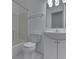 Clean bathroom with a shower and tub combo, a new toilet, and a sleek vanity and sink at 4675 Walker St, Greenwood, IN 46143