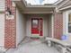Close up of the bright red front door at 4675 Walker St, Greenwood, IN 46143