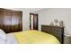 Comfortable bedroom featuring a dresser, and ample closet space at 5015 Carrollton Ave, Indianapolis, IN 46205