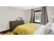 Bright bedroom with large window providing ample natural light at 5015 Carrollton Ave, Indianapolis, IN 46205