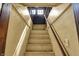 A bright stairwell leading to the attic at 5015 Carrollton Ave, Indianapolis, IN 46205