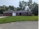 Charming brick ranch with a well-maintained lawn and a two-car garage in a mature neighborhood at 5043 Harway Ct, Indianapolis, IN 46227