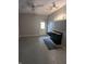 A spacious room with sink, white board, and outdoor access, perfect for a creative space at 5043 Harway Ct, Indianapolis, IN 46227