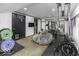 Basement gym featuring workout equipment and entertainment area at 5137 Green Hills Dr, Brownsburg, IN 46112