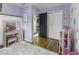 Cozy bedroom featuring a vanity and pink accents at 5137 Green Hills Dr, Brownsburg, IN 46112