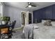 Bedroom features paneled wall, large area rug and comfy bed at 5137 Green Hills Dr, Brownsburg, IN 46112