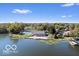 Beautiful aerial view of lakeside community amenities including a pool, clubhouse and docks at 5225 Elderberry Rd, Noblesville, IN 46062