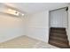 Finished basement featuring tile flooring, fresh white paint, and ample lighting at 5225 Elderberry Rd, Noblesville, IN 46062