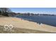 Community beach area with sandy shore on a sunny day at 5225 Elderberry Rd, Noblesville, IN 46062