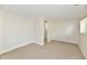 Bedroom featuring neutral carpet, light colored walls, and access to a possible ensuite bathroom at 5225 Elderberry Rd, Noblesville, IN 46062