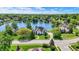 Beautiful aerial view of the home and lake in a quiet residential neighborhood at 5521 Salem N Dr, Carmel, IN 46033