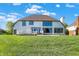 Large backyard with a beautiful lawn and a deck for outdoor enjoyment at 5521 Salem N Dr, Carmel, IN 46033
